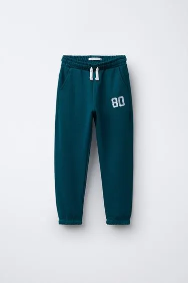 Джоггеры из мягкой ткани с номером- Заказать в России