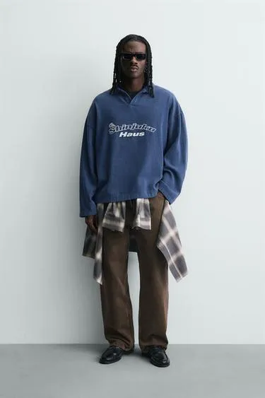 Поло с вышивкой