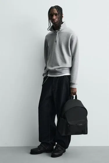 Прорезиненный рюкзак