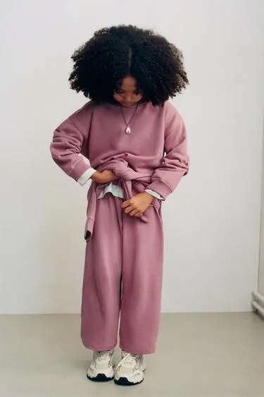 Брюки WIDE LEG из мягкой ткани с рельефной надписью- Заказать в России