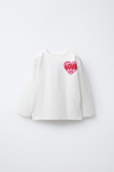 Zara Лонгслив с рельефным принтом купить с доставкой.