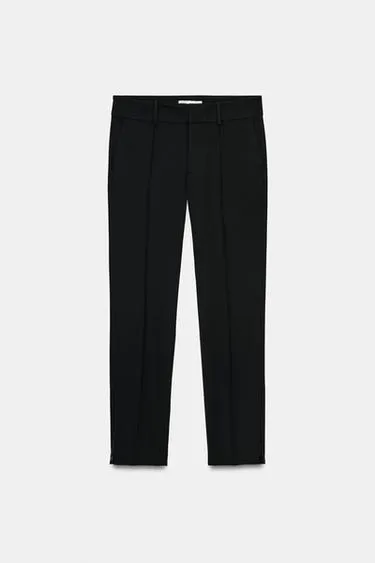 Брюки на молнии