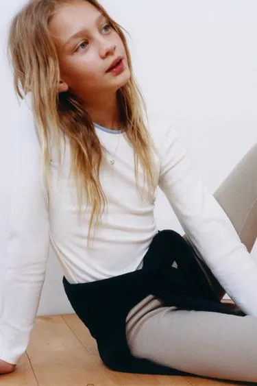 Легинсы в рубчик из модала с этикеткой