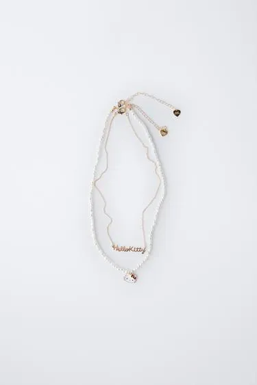 Набор из двух колье HELLO KITTY © SANRIO- Заказать в России