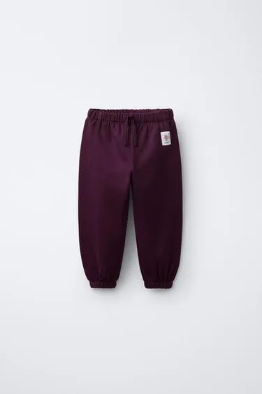 Джоггеры из мягкой ткани с этикеткой- Заказать в России