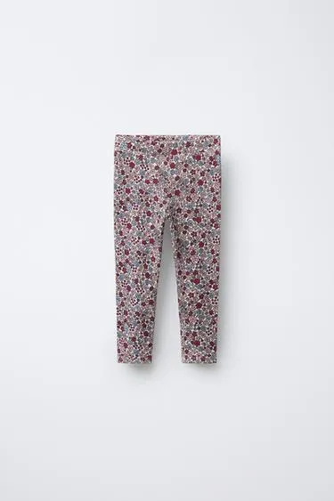 Леггинсы в рубчик с принтом