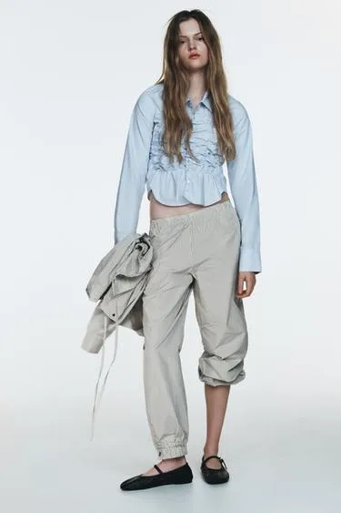 Нейлоновые брюки-бомбашки в клетку- Заказать в России