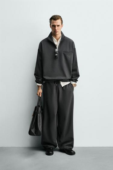 Толстовка с принтом щита- Заказать в России