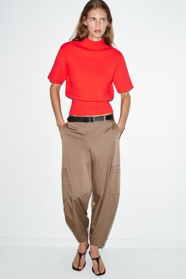 Трикотажный топ с плечевыми подушками- Заказать в России