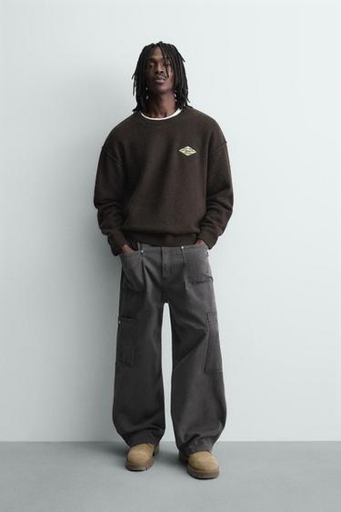 Zara Жаккардовый свитер с надписью