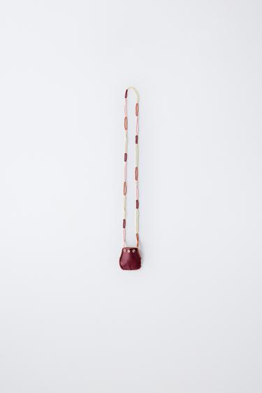 Zara Ожерелье с бусинами и сумочкой купить с доставкой.