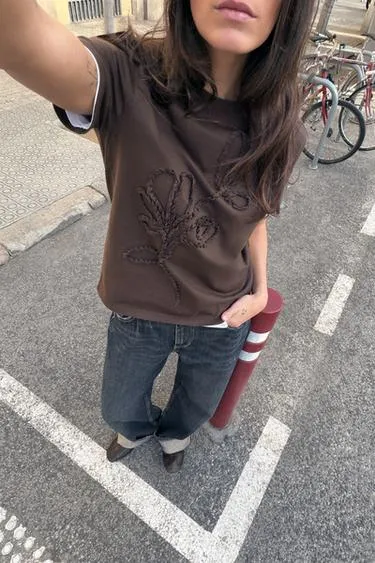 Футболка с рельефными бантами- Заказать в России