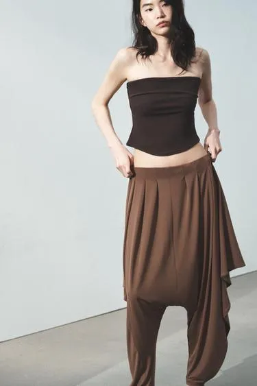 АCимметричные брюки BAGGY из струящейся ткани- Заказать в России