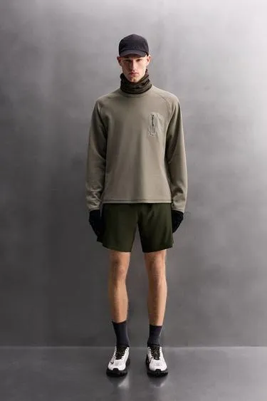 Футболка из рельефной ткани вафельного переплетения с карманом- Заказать в России