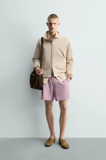 Потоковые бермуды в клетку- Заказать в России