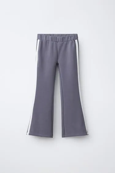 Расклешенные брюки из модала с контрастными полосками