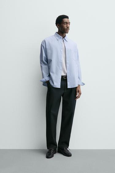 Брюки со складками из рельефной ткани- Заказать в России