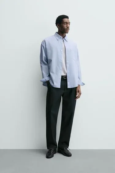 Брюки со складками из рельефной ткани- Заказать в России