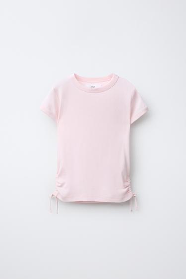 Футболка из модала с вырезами и бантами