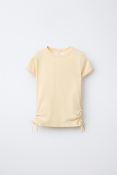 Футболка из модала с вырезами и бантами- Заказать в России