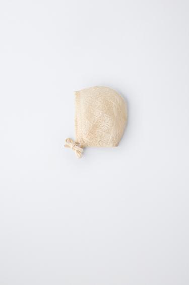 Вязаный чепчик ажурной вязки- Заказать в России