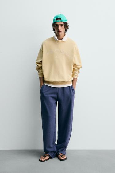 Толстовка с эффектом потертости с принтом