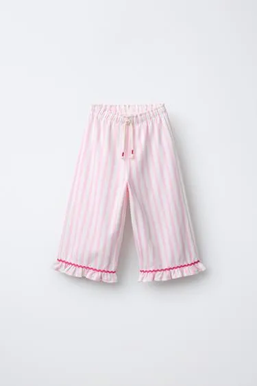 Брюки в полоску с воланами- Заказать в России