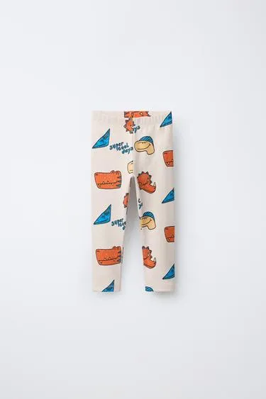 Легинсы в рубчик с анималистичным принтом