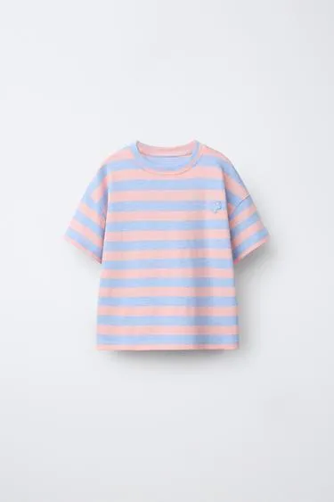 Футболка в полоску с цветочной нашивкой- Заказать в России