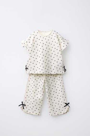 Комплект из футболки и брюк с цветочным принтом и бантами- Заказать в России