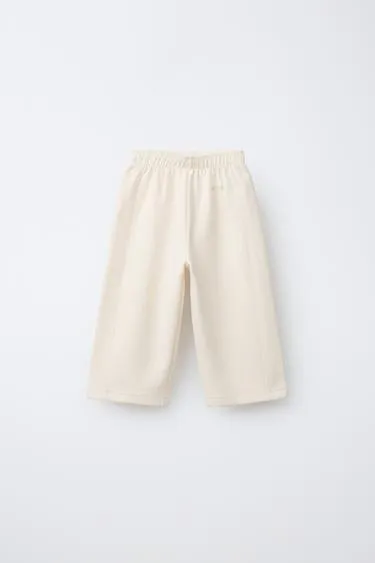 Брюки WIDE LEG из ткани интерлок с рельефной надписью