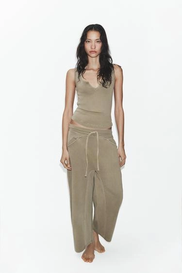 Топ в рваном стиле с эффектом выцветания