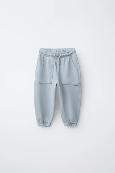 Брюки-джоггеры GARMENT DYE с нашивкой