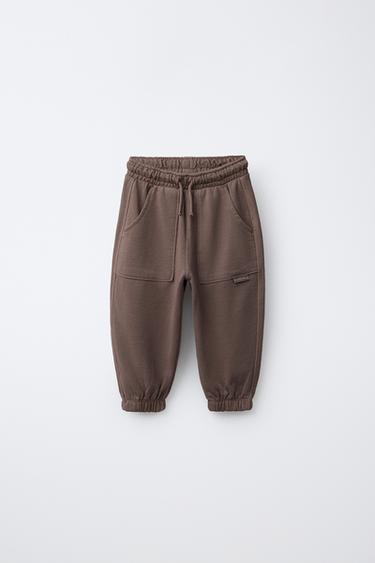 Zara Брюки-джоггеры GARMENT DYE с нашивкой купить с доставкой.