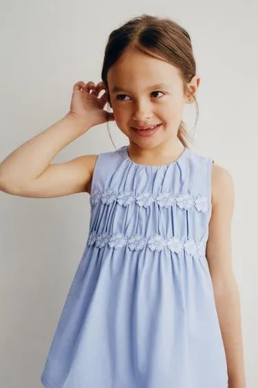 Блуза с цветочными складками