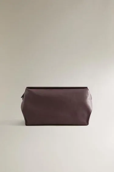 Кожаная косметичка минималистичного дизайна- Заказать в России