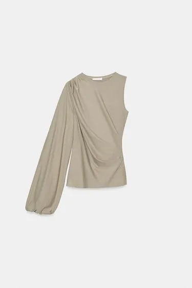 Топ асимметричного кроя с объемными рукавами- Заказать в России