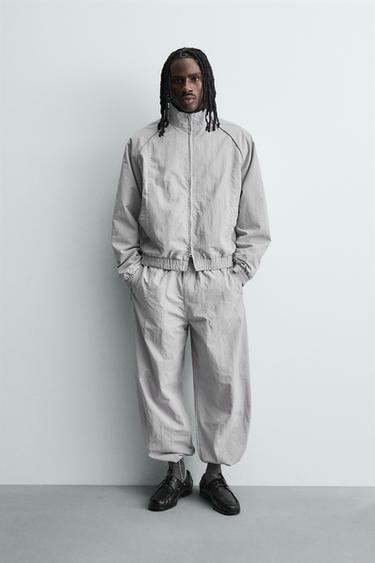 Zara Джоггеры из высокотехнологичной ткани с контрастными лампасами