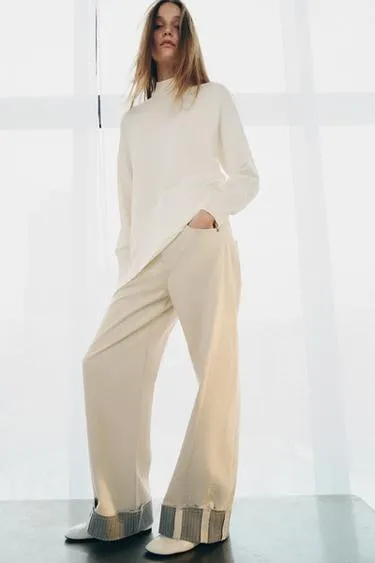 Асимметричный свитер из комбинированного трикотажа- Заказать в России