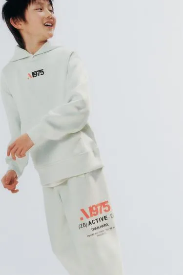 Толстовка в спортивном стиле с принтом- Заказать в России