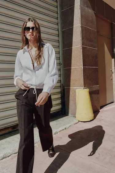 Широкие брюки с двойным поясом- Заказать в России