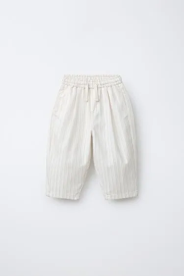 Удобные брюки в полоску