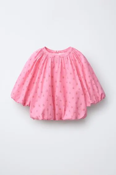 Блуза с объемными рукавами и цветочным принтом- Заказать в России