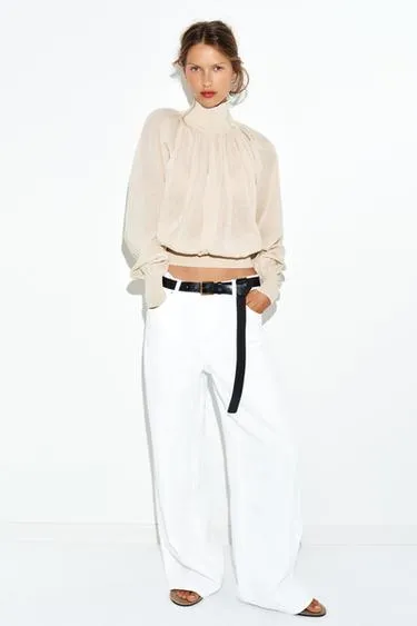 Блуза свободного кроя из комбинированного трикотажа