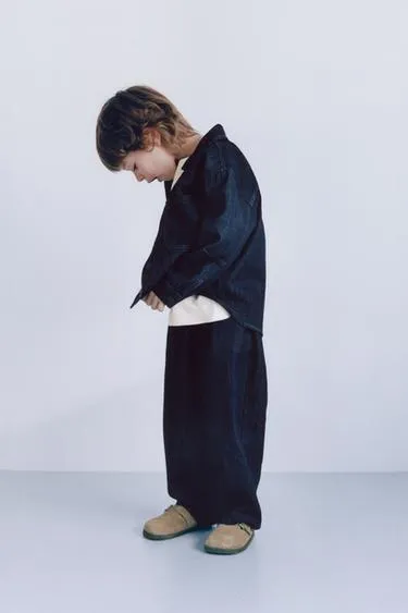 Джинсовая рубашка с прорезиненными пуговицами- Заказать в России