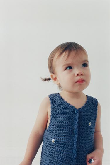 Комбинезон вязаный ажурный с вышитыми цветами