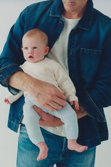 Свитер с нашивками «кролики»