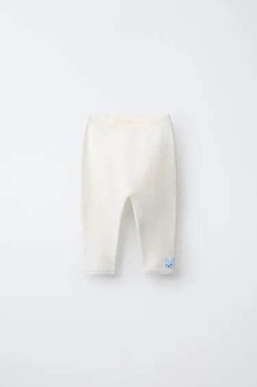 Трикотажные брюки с заплаткой «кролик»- Заказать в России