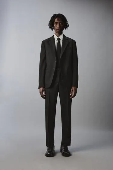 Костюмные брюки из 100% шерсти