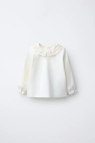 Топ с вышивкой в швейцарском стиле- Заказать в России